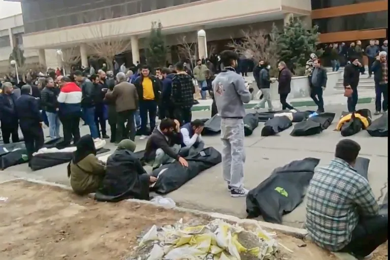 Body bags in the street in Kahrizak, Iran, taken between Jan. 9 and Jan. 11, 2026.