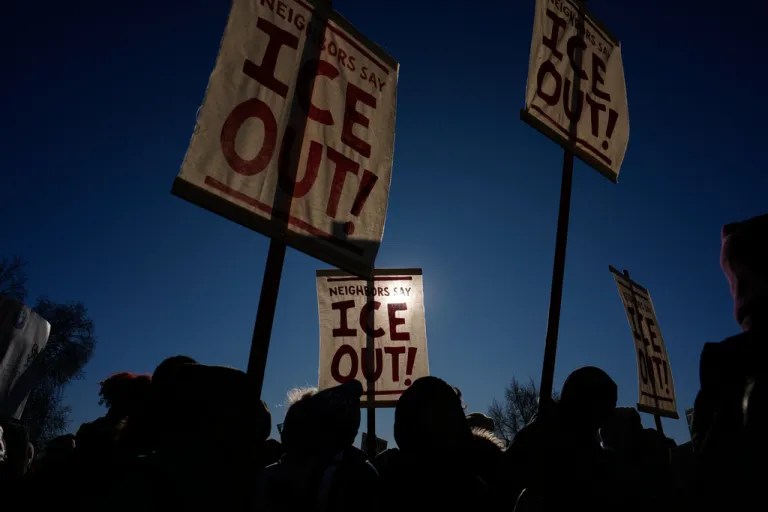 Protesters gather in front of the Minnesota state Capitol in response to the death of Renee Good, who was fatally shot by an ICE officer.
