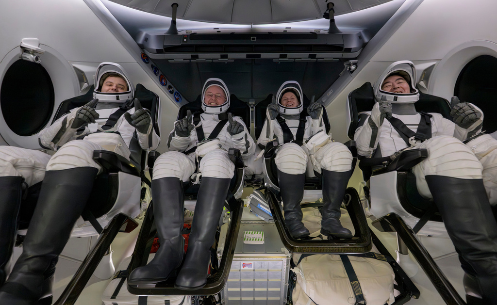 NASA astronauts land after medical emergency caused early end to mission