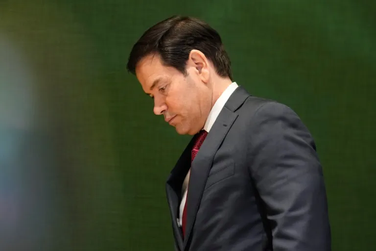 United States Secretary of State Marco Rubio walks down stairs after a meeting during the Annual Meeting of the World Economic Forum in Davos, Switzerland, Wednesday, Jan. 21, 2026. (AP Photo/Markus Schreiber)