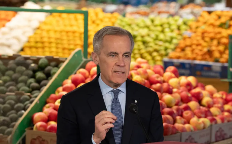 Canadian Prime Minister Mark Carney is seen during an event at a grocery store in Ottawa on Monday, Jan. 26, 2026. (Adrian Wyld/The Canadian Press via AP)