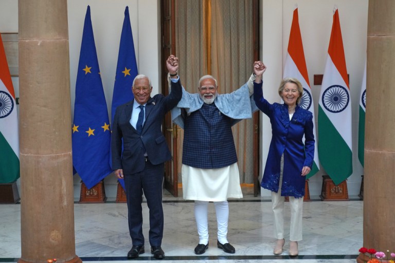 Indian Prime Minister Narendra Modi, center, welcomes European Council President Antonio Costa, left and European Commission President Ursula von der Leyen before their meeting in New Delhi 2026