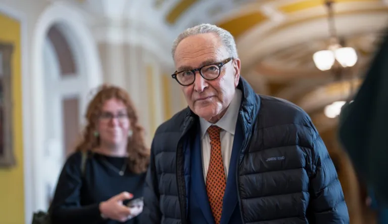 Senate Minority Leader Chuck Schumer, D-N.Y., arrives at his office as the Senate returns at the Capitol in Washington, Tuesday, Jan. 27, 2026. (AP Photo/J. Scott Applewhite)