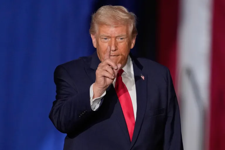 President Donald Trump arrives to speak about the economy at a rally Tuesday, Jan. 27, 2026, in Clive, Iowa. (AP Photo/Charlie Neibergall)