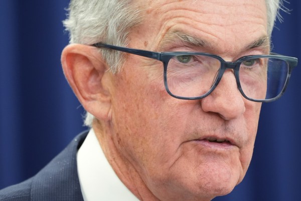 Powell says he will stay on Fed board after chairmanship ends, denying Trump a spot