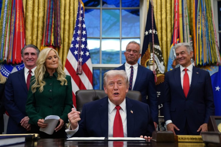 President Donald Trump speaks before signing an executive order on addiction recovery in the Oval Office of the White House, Thursday, Jan. 29, 2026, in Washington, as from left Interior Secretary Doug Burgum, Kathryn Burgum, Health and Human Services Secretary Robert F. Kennedy Jr. and Centers for Medicare & Medicaid Services administrator Dr. Mehmet Oz watch.