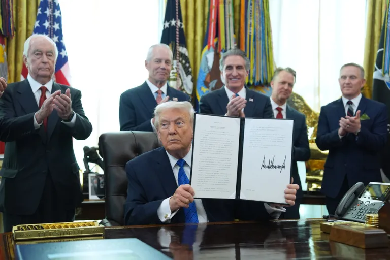 President Donald Trump speaks as he signs executive orders in the Oval Office of the White House, Friday, Jan. 30, 2026, in Washington.
