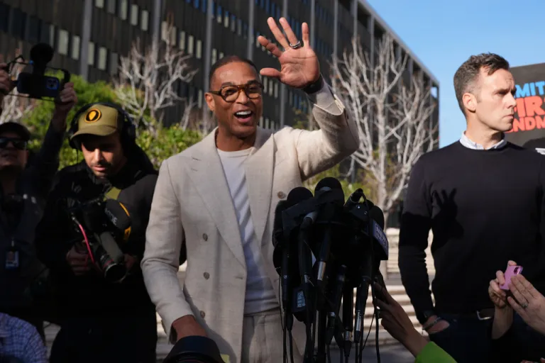 Journalist Don Lemon, waves to the media after a hearing outside the Edward R. Roybal Federal Building in Los Angeles on Friday, Jan. 30, 2026. (AP Photo/Damian Dovarganes)
