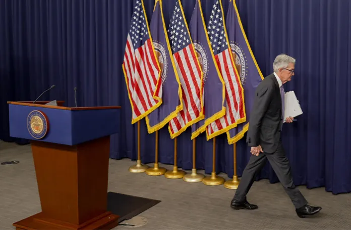 Jerome Powell, chairman of the US Federal Reserve, departs a news conference in Washington, DC, US, on Dec. 10, 2025. (Al Drago/Bloomberg via Getty Images)
