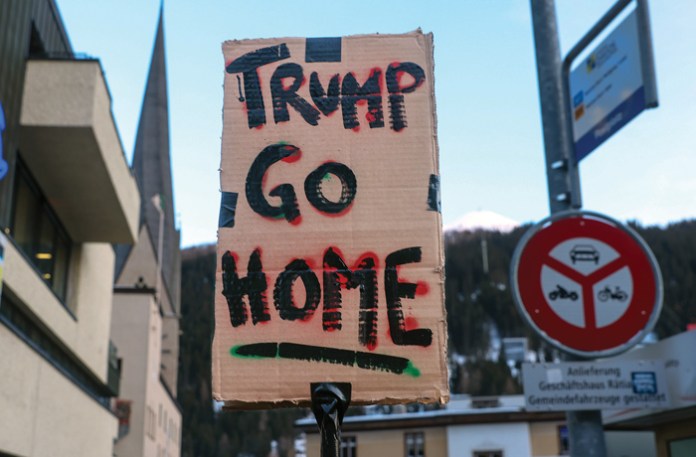 A protest against President Donald Trump’s visit to the World Economic Forum in Davos, Switzerland, Jan 18, 2026. (Krisztian Bocsi/Blooomberg/Getty)