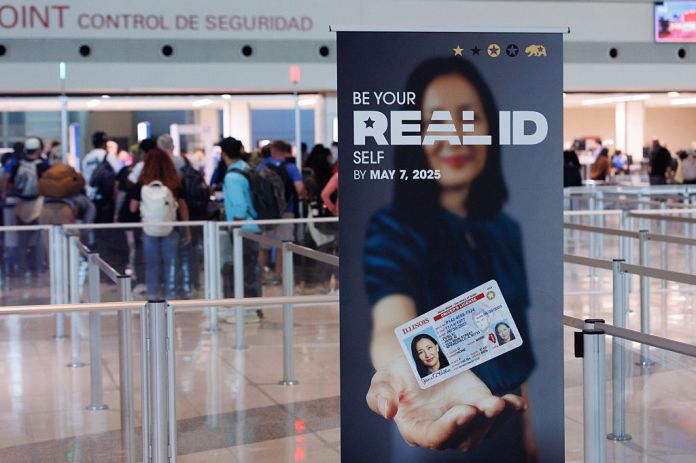 Travelers wait in line at the TSA security checkpoint at Dallas Love Field Airport (DAL) in Dallas, Texas, US, on Wednesday, Aug. 27, 2025. For the first time in almost 20 years, pre-flight screening as of last month no longer requires passengers to take off their shoes and run them through X-ray machines, and officials have signaled they intend to ease the rule limiting containers of carry-on liquids to no more than 3.4 ounces. Photographer: Shelby Tauber/Bloomberg via Getty Images