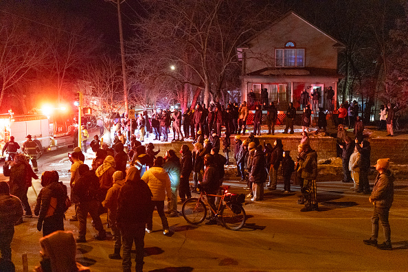 Residents confront federal agents following a shooting incident on January 14, 2026 in Minneapolis, Minnesota. According to reports, a federal agent shot a Venezuelan man who was resisting arrest. The Trump administration has sent a reported 2,000 federal plus federal agents into the area, with more on the way, as they make a push to arrest undocumented immigrants in the region. The Trump administration has sent a reported 2,000 federal plus federal agents into the area, with more on the way, as they make a push to arrest undocumented immigrants in the region.