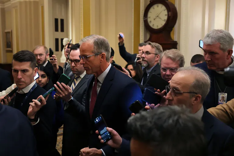 Senate Majority Leader John Thune (R-SD) talks with reporters in the U.S. Capitol.