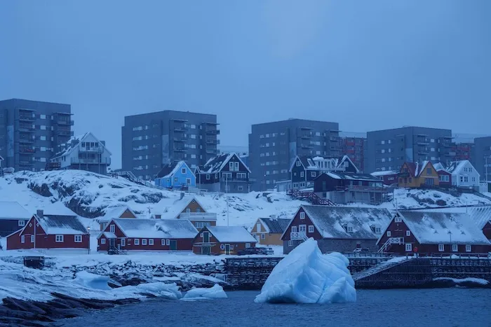 Ice floats on the sea off the coast of Nuuk, Greenland.