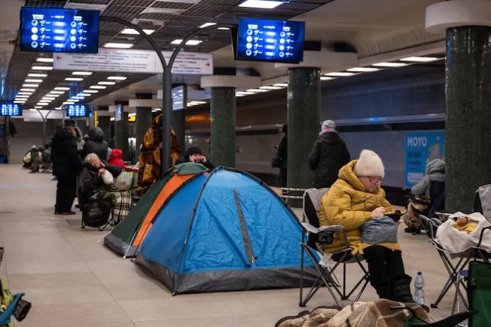 People take shelter in a subway station during Russia's night missile and drone attack in Kyiv, Ukraine.