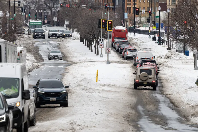Washington, D.C. residents grapple with poor road conditions caused by winter storm. (Credit: Graeme Jennings)