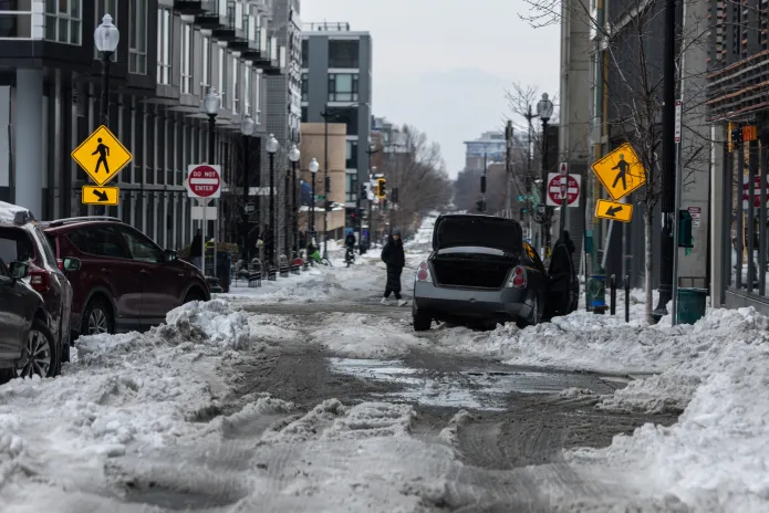 Washington, D.C. residents grapple with poor road conditions caused by winter storm. (Credit: Graeme Jennings)