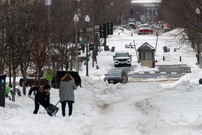 Washington, D.C. residents grapple with poor road conditions caused by winter storm. (Credit: Graeme Jennings)