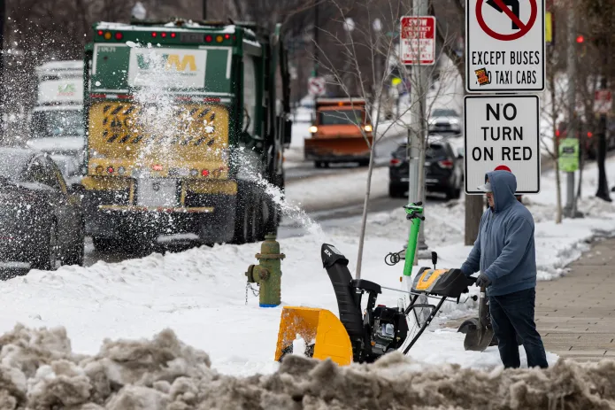 Washington, D.C. residents grapple with poor road conditions caused by winter storm. (Credit: Graeme Jennings)