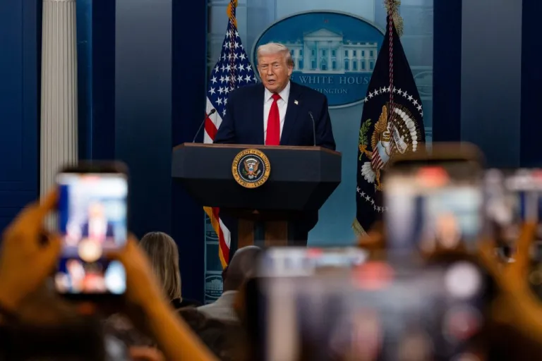 President Donald Trump speaks to the White House press corps on the one year anniversary of his second inauguration.