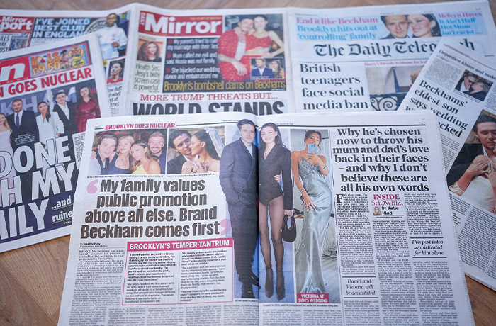 UK newspaper front pages display stories and images on the Beckham family feud on January 20, 2026 in London, England. (Mark Case/Getty Images)