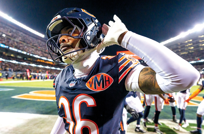 Chicago Bears’ Jonathan Owens gestures to the fans at Solider Field in Chicago. (Todd Rosenberg/Getty Images)