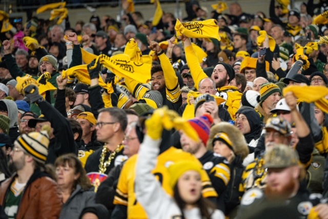 Steeler fans twirling the "terrible towel" a tradition that dates back to the 1970s when the Pittsburgh Steelers went from a perpetual losing organization to winning four Super Bowl in a decade.