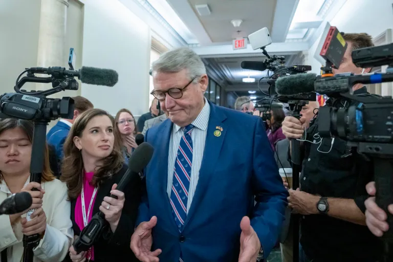 Rep. Rick Allen surrounded by press