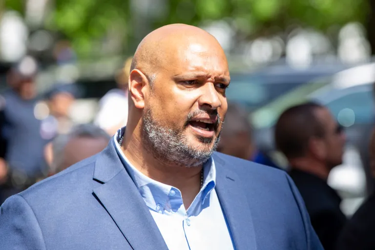 Former Capitol police officer Harry Dunn speaks in support of President Joe Biden across the street from former President Donald Trump's criminal trial in New York, Tuesday, May 28, 2024. (AP Photo/Ted Shaffrey)