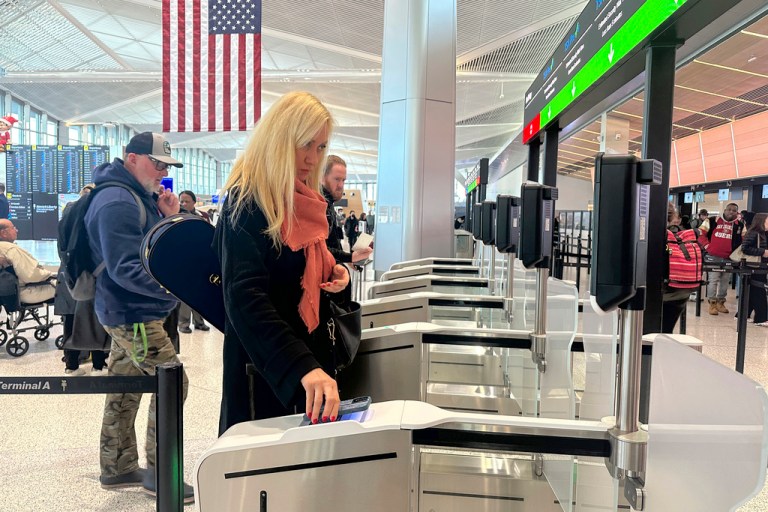 Departing air travelers enter the TSA PreCheck screening lane at Newark Liberty International Airport in New Jersey on Wednesday, December 19, 2024. (AP Photo/Ted Shaffrey)