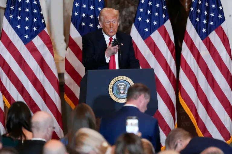 President Donald Trump arrives to speak during the National Prayer Breakfast at the Capitol.
