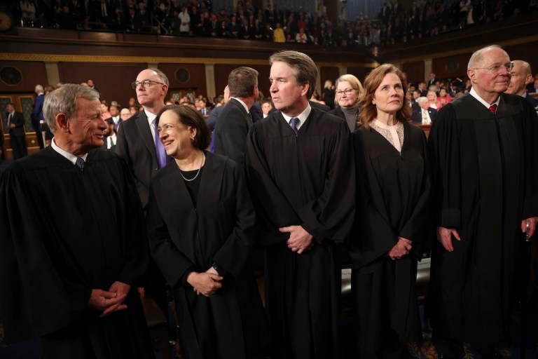From left, Chief Justice of the Supreme Court John Roberts, Justice Elena Kagan, Justice Brett Kavanaugh, Justice Amy Coney Barrett, and retired Justice Anthony Kennedy are seen before President Donald Trump addresses a joint session of Congress at the Capitol in Washington, Tuesday, March 4, 2025. (Win McNamee/Pool Photo via AP)