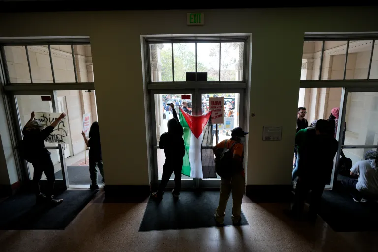 Pro-Palestinian demonstrators gather inside a building on the UCLA campus, May 23, 2024, in Los Angeles. (AP Photo/Ryan Sun, File)