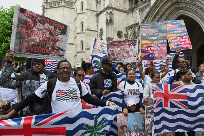 Chagossians protest outside a high court in London