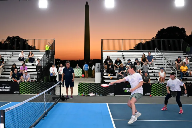 Sen. Bernie Moreno, R-Ohio, left, and Sen. Shelley Moore Capito, R-W.Va., participate in a Congressional Pickleball Match held on the National Mall on Thursday, Sept. 18, 2025, in Washington.