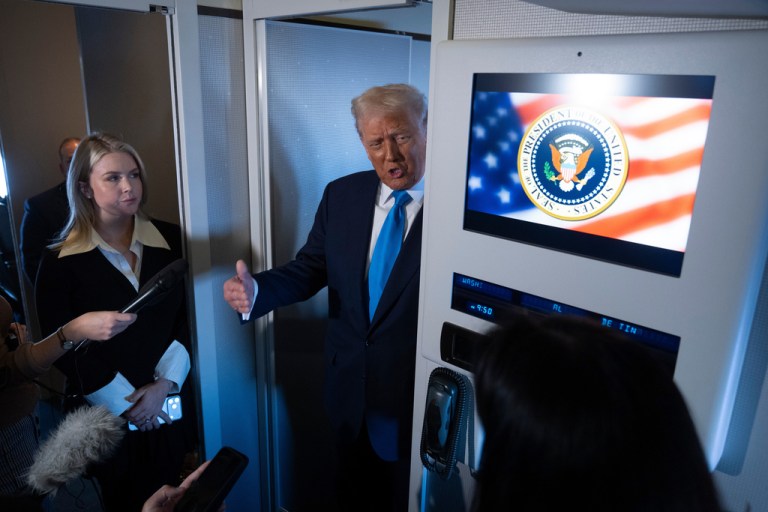 President Donald Trump talking to reporters on Air Force One.