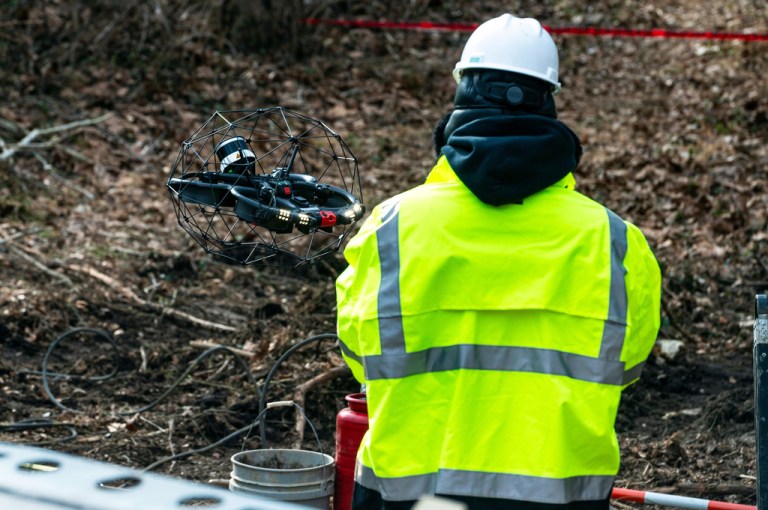 A drone is deployed to inspect the inside of a cofferdam being built to stop the flow of raw sewage into the Potomac River.