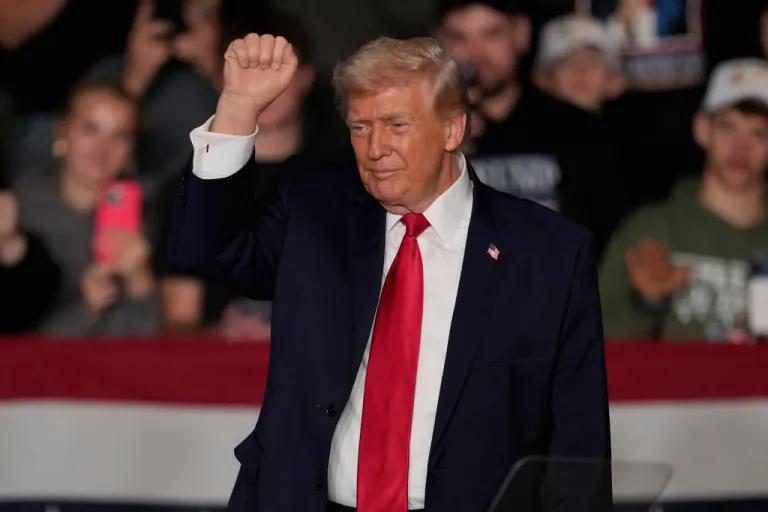 President Donald Trump gestures after speaking about the economy at a rally Tuesday, Jan. 27, 2026, in Clive, Iowa. (AP Photo/Charlie Neibergall)