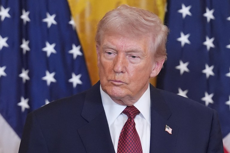 President Donald Trump listens during an event on coal power in the East Room of the White House