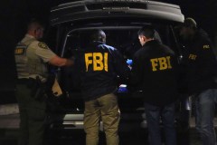 Glove with DNA found near Guthrie home appears to match those worn in suspect video: FBI
