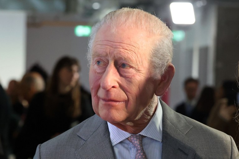 Britain's King Charles III reacts during an exhibition celebrating sustainable British innovation as he opens London Fashion Week 2026, at 180 Studios, central London, Thursday Feb. 19, 2026.