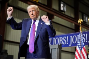 President Donald Trump dances after speaking at a rally at Coosa Steel Corporation.