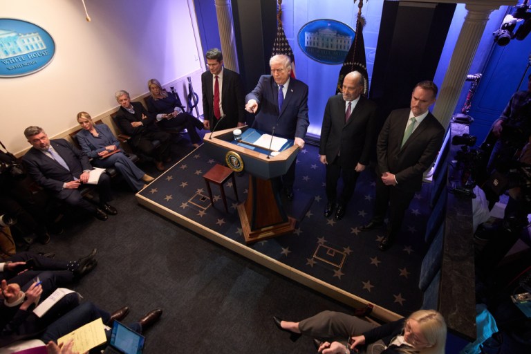 President Donald Trump speaks during a press briefing at the White House.
