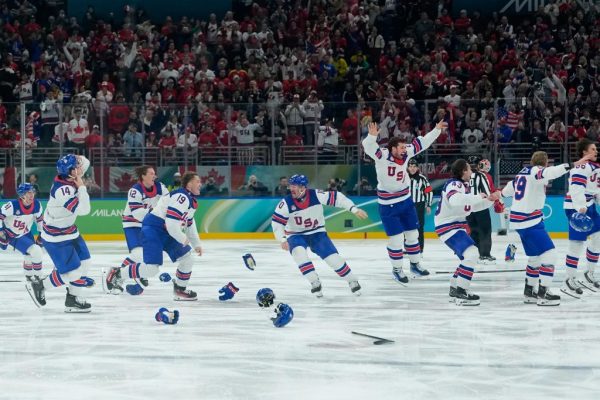 US beats Canada in OT to take home first hockey gold since 1980