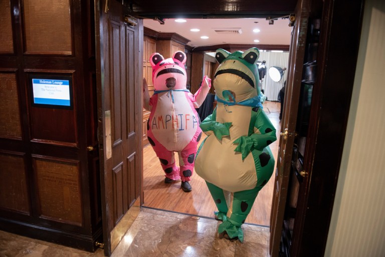 Members of the Portland Frog Brigade greet guests at a rebuttal to President Donald Trump's State of the Union hosted by Defiance.org, the Portland Frog Brigade and COURIER at the National Press Club in Washington, Tuesday, Feb. 24, 2026.