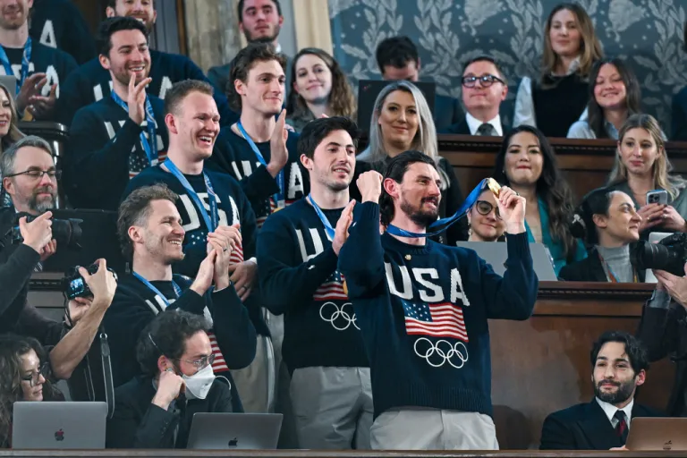 Members of the United States' Olympic hockey team, goalie Connor Hellebuyck in front, attend President Donald Trump's State of the Union address to a joint session of Congress in the House chamber at the U.S. Capitol in Washington, Tuesday, Feb. 24, 2026. (Kenny Holston/The New York Times via AP, Pool)