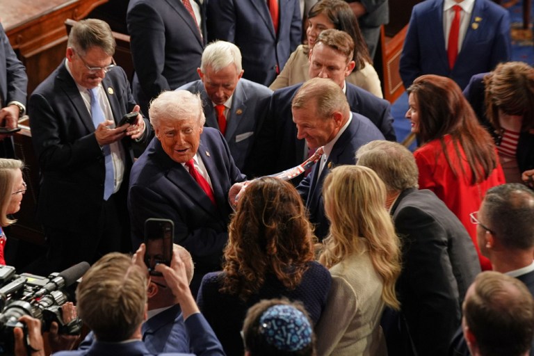 The White House was quick to point out a number of Democratic lawmakers who did not stand and cheer during President Donald Trump's remarks on immigration and law and order during Tuesday night's State of the Union address. (AP Photo/Matt Rourke)