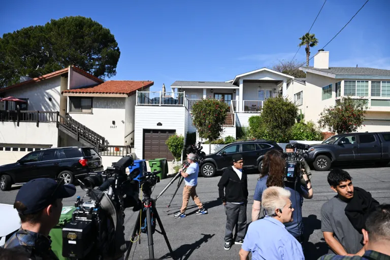 Media stage outside the home of Los Angeles Unified School District Superintendent Alberto Carvalho.