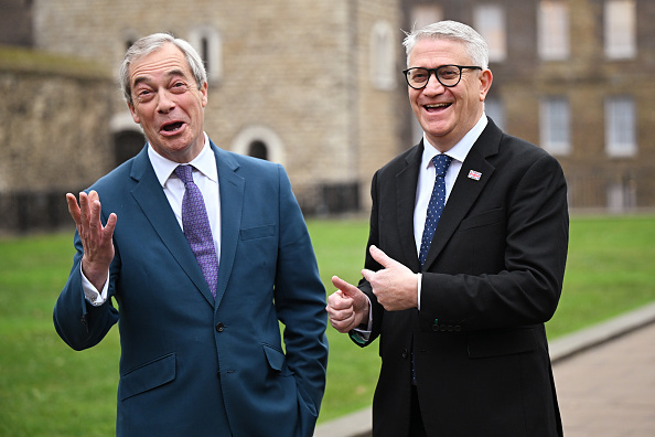U.K. Member of Parliament Andrew Rosindell poses with Reform UK leader Nigel Farage.
