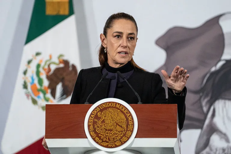 President of Mexico Claudia Sheinbaum Pardo speaks during the daily morning briefing at Palacio Nacional on February 23, 2026 in Mexico City, Mexico. The Secretariat of National Defense of Mexico confirmed that during a security operation in Tapalpa, Jalisco, Nemesio Oseguera Cervantes, known as 'El Mencho', leader of the Jalisco New Generation Cartel, was killed. Mexican authorities confirmed the deaths of over 25 members of the armed forces in different attacks by the Cartel after the operation that killed Oseguera. (Photo by Cristopher Rogel Blanquet/Getty Images)